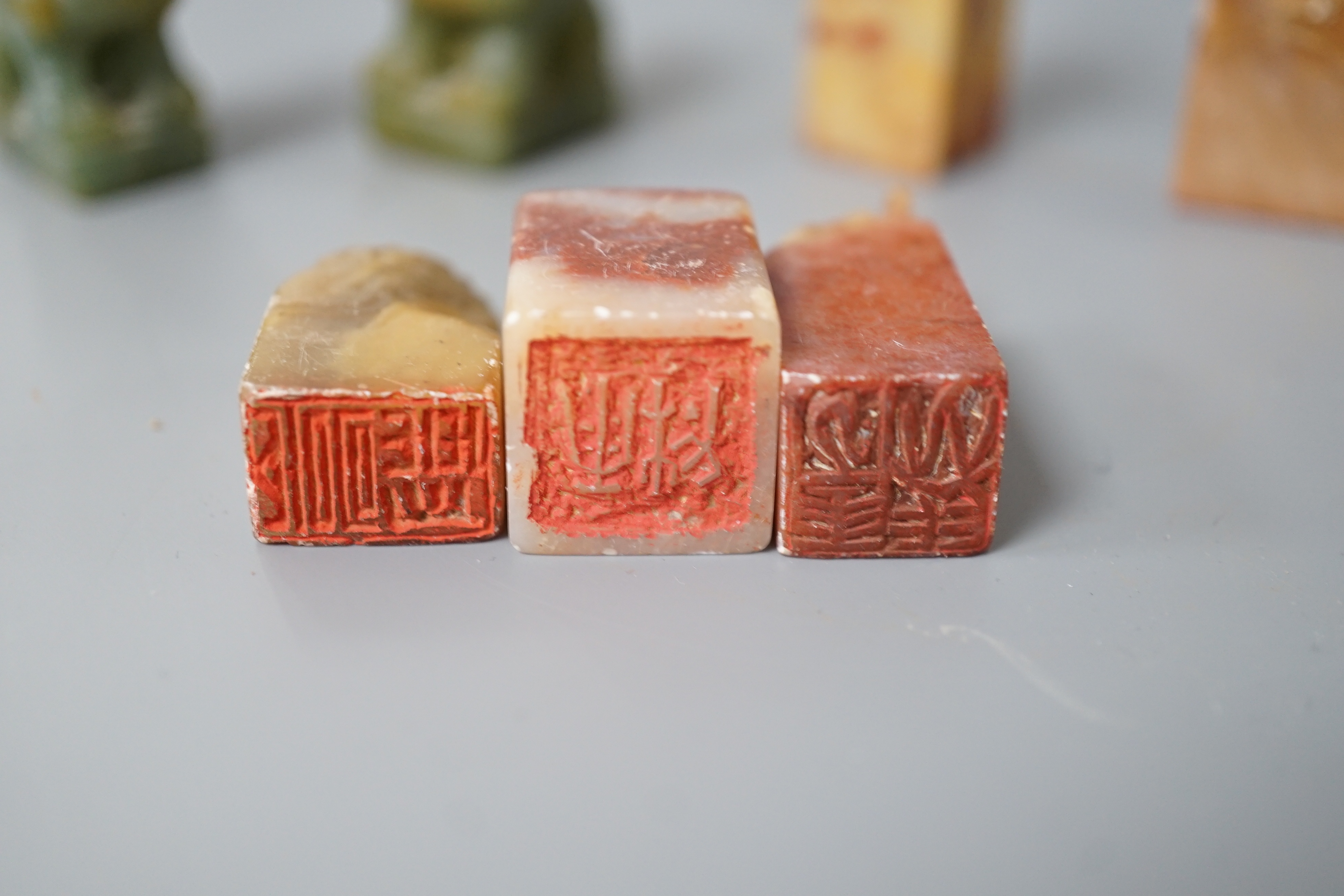 A selection of five Chinese mixed stone seals together with a pair of small jadeite dog figures (7), largest 5.5cm